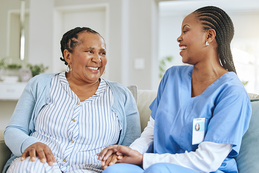 shot-nurse-speaking-her-female-patient